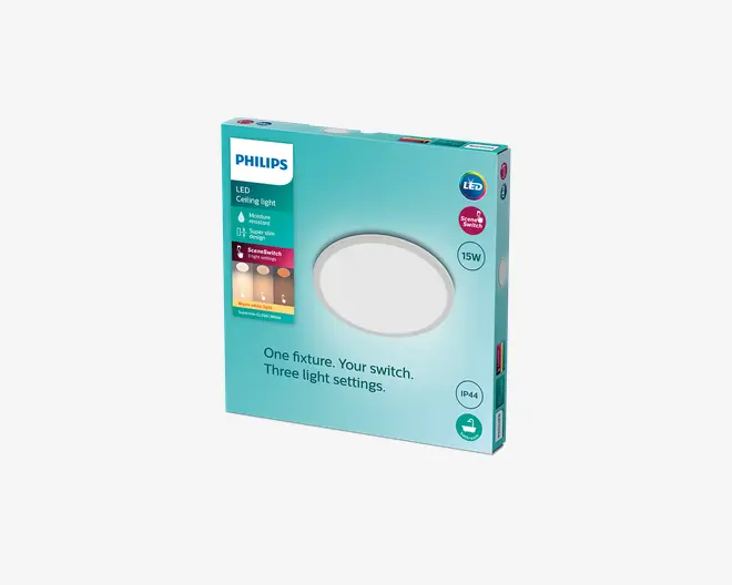 Philips LED loftlampes emballage i en turkis æske med en rund hvid lampeplade, 15W, SceneSwitch, IP44 og tre lysindstillinger.