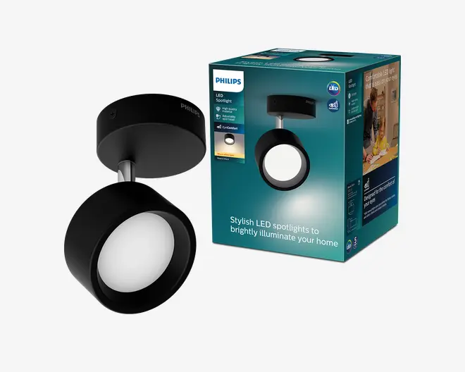Sort Philips LED-spotlight med rundt, justerbart lampehoved og matchende loftsophæng, vist ved siden af den turkise emballage med samme produktbillede.