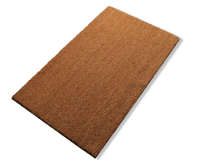 Rektangulær måtte med en grov, tekstureret overflade i en naturlig brun farve. Måtten ser ud til at være lavet af slidstærkt, fiberrigt materiale, sandsynligvis kokos, og har rene, lige kanter. Den er designet til effektivt at fjerne snavs og skidt fra sko.