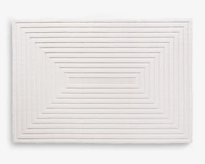 Rektangulært produkt med en tekstureret overflade, der har en række koncentriske, hævede rektangulære linjer, som skaber en geometrisk, tredimensionel effekt. Farven er ensartet, ren hvid, og kanterne er pænt afsluttede. Designet er minimalistisk og moderne, velegnet til nutidige indretninger.