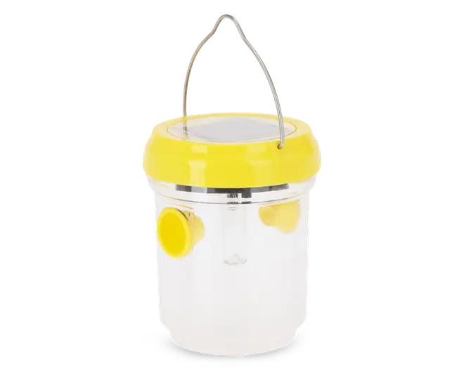 Gennemsigtig plastbeholder med et kraftigt gult låg, der har indbygget solcellepanel på toppen og et solidt metalhåndtag. Beholderen har to gule tragtformede indgange på siderne og et gennemsigtigt indvendigt rør, hvilket gør den nem at rengøre og vedligeholde.