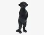 En sort geometrisk bjørnefigur, der står oprejst, med facetteret low-poly overflade og små, runde ører.