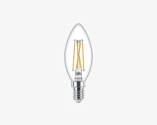 Klar, stearinlysformet LED-pære med synlig filamentdesign og skruefatning for nem montering. Pæren har et gennemsigtigt glas og udsender et varmt lys, velegnet til dekorative lamper. Mærket "Philips" er trykt nær soklen.