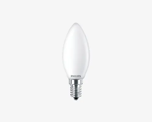 Mat, stearinlysformet pære med lille skruefatning (E14), glat hvid overflade og kompakt design. Pæren har Philips-logoet trykt nær fatningen, og dens spidse form egner sig til dekorative lamper som lysekroner eller væglamper.