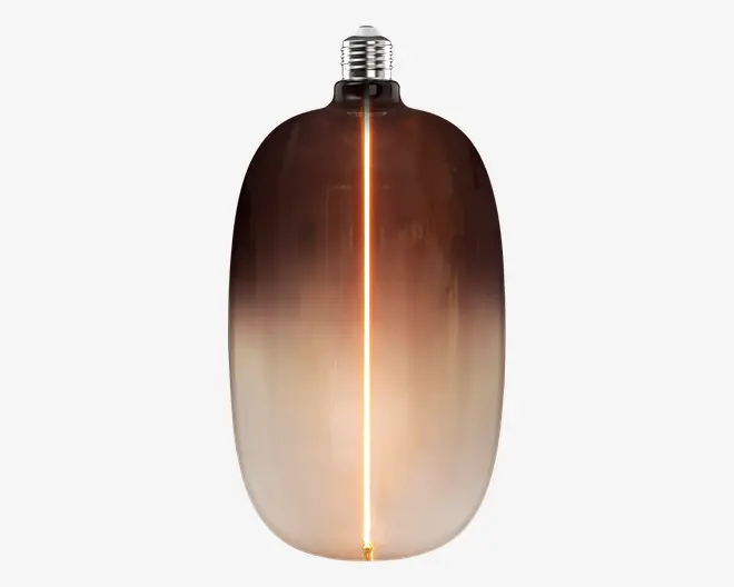 Aflang dekorativ pære med glas i en røget brun-til-mat gradient og en lysende lodret glødetråd i midten.