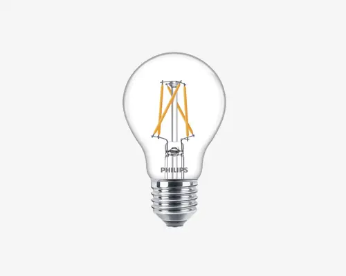 Klar glaspære med synlige LED-filamenter arrangeret lodret, sølvfarvet skruefatning og Philips-logo trykt nær bunden. Pæren har en klassisk rund form og et moderne, energieffektivt design.