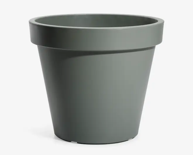 En enkel, mat beholder med cylindrisk form og bred kant øverst. Overfladen er glat, og farven er en afdæmpet grågrøn. Beholderen bliver smallere mod bunden, hvilket giver den en klassisk og funktionel form.