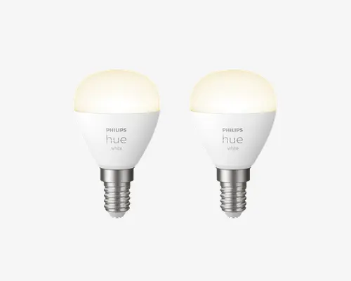 Sæt med to kompakte LED-pærer med rund, mat top og metal skruefatning. Pærerne har en hvid finish og er mærket med mærke og model. De er designet til intelligente belysningssystemer og har E14 lille skruefatning, hvilket gør dem velegnede til mindre lamper og armaturer.
