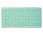 Rektangulært produkt med en blød, tekstureret overflade, der har et gentagende mønster af blå ovale ringe på en lysegrøn baggrund. Kanterne er pænt syet, og det samlede design er moderne og legende.