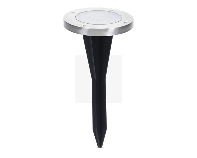 Rund udendørs jordlampe med top i rustfrit stål og klart linse, udstyret med sort spids jordspyd for nem montering i jorden. Toppen har fire synlige skruer, der fastgør linsen, og designet er stilrent og moderne.