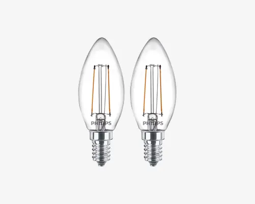 Sæt med to klare, stearinlysformede LED-pærer med synligt filamentdesign. Hver pære har en skruesokkel og et gennemsigtigt glas, så de indvendige filamenter er synlige. Pærerne har et klassisk og elegant udseende, der passer til dekorative armaturer.