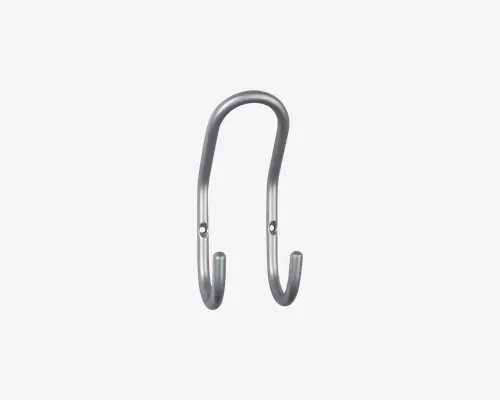 En metal dobbeltkrog med et glat, buet design og børstet finish. Krogen har to monteringshuller til sikker fastgørelse på væggen og to afrundede ender til ophængning af genstande. Det overordnede udseende er slankt og moderne, velegnet til både hjemmet og kontoret.
