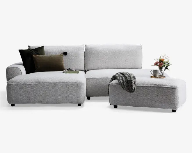 Puf i lys beige møbelstof