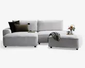 Puf i lys beige møbelstof