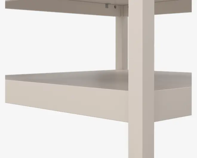 Nærbillede af en lys beige skuffe med en glat, mat overflade. Skuffen er indbygget i en robust ramme og har rene, lige linjer for et moderne udtryk. Konstruktionen virker solid, uden synlige greb, hvilket giver et minimalistisk udseende.