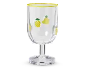 Klar glasbæger med kort, solid stilk og bred fod. Glassets skål er dekoreret med små, farverige illustrationer af ananas og mango, og kanten er fremhævet med en lys gul stribe.