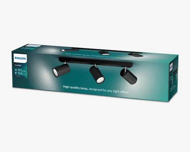 Lang Philips Spotlight-emballage i blågrøn og sort med tre justerbare sorte cylindriske lampehoveder monteret på en skinne, Philips-logoet til venstre og produktoplysninger trykt på kassen.