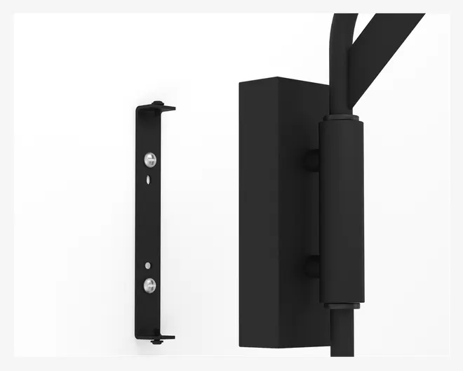 Nærbillede af et mat sort metalhængsel med en rektangulær monteringsplade og cylindrisk drejeled, vist ved siden af en separat flad monteringsbeslag med to synlige skruer. Hængslet har et moderne, minimalistisk design og er beregnet til sikker fastgørelse på en flad overflade.