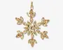 Et dekorativt ornament formet som en snefnug, med flere guldfarvede, facetslebne krystaller arrangeret i et symmetrisk mønster. Krystallerne er marquise-slebne og runde, hvilket giver en glitrende effekt. Ornamentet har en guldfarvet løkke øverst til ophængning.