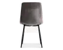 Stol med glat, let buet ryg og sæde betrukket med et blødt, gråt stof. Stolen har fire skråtstillede, sorte metalben, der giver stabilitet og et moderne udtryk. Designet er minimalistisk og nutidigt med rene linjer og et behageligt, polstret sæde.