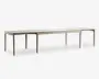 Rektangulært bord med lys træfinish, designet med en lang og udvidet form, der egner sig til mange siddepladser. Bordet har rene, lige linjer og seks slanke ben, hvilket giver det et moderne og minimalistisk udtryk.