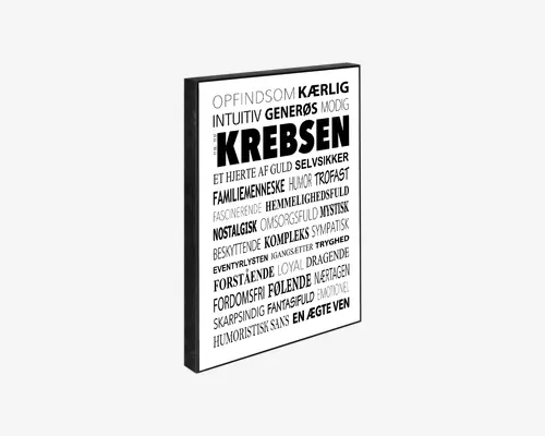Rektangulært vægkunst med sort ramme og hvid baggrund, der viser en række danske ord og sætninger i forskellige skrifttyper og størrelser. Teksten er arrangeret på en visuelt interessant måde, hvor ordet 'KREBSEN' står tydeligt frem i store, fede bogstaver. Andre ord og sætninger beskriver personlighedstræk og karakteristika, såsom 'opfindsom', 'kærlig', 'generøs' og 'intuitiv'. Typografien er moderne og enkel, hvilket gør designet velegnet til moderne boligindretning.
