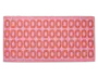Rektangulært måtte med lyserød baggrund og et gentaget mønster af store, afrundede orange ovaler arrangeret i rækker. Måtten har en tekstureret overflade og en pænt afsluttet kant.