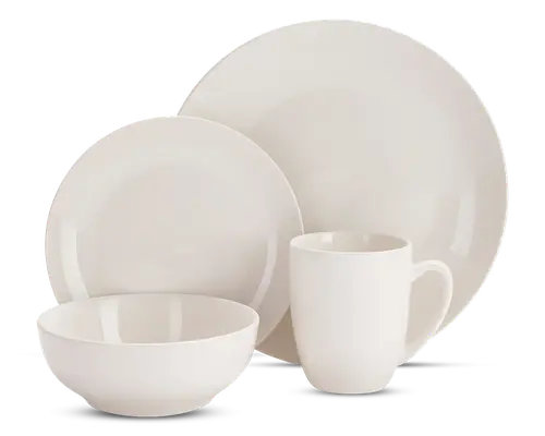 Sættet består af en stor middagstallerken, en mindre frokosttallerken, en skål og et krus. Alle dele er lavet af glat, blankt hvidt keramik med et minimalistisk design og blødt buede kanter. Kruset har et behageligt håndtag, og skålen er dyb og rund, velegnet til suppe eller morgenmad. Tallerkenerne har et enkelt og rent udtryk uden mønstre eller dekorationer.