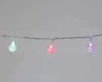 En lyskæde med små, runde pærer, der har en tekstureret, krakeleret overflade. Pærerne lyser i forskellige farver, herunder grøn, rød og lilla, og er jævnt fordelt langs en tynd, snoet ledning. Designet giver et festligt og moderne udtryk, velegnet til dekoration både inde og ude.