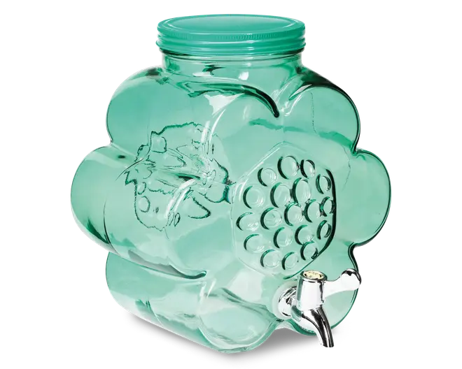 En gennemsigtig, lysegrøn glasbeholder med blomsterformet design. Beholderen har prægede vindrueklaser på forsiden og en sølvfarvet hane nederst til nem udskænkning. Den har et bredt skruelåg øverst, som gør det let at fylde og rengøre beholderen.