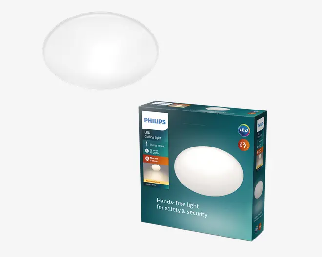 En rund, flad LED-loftlampe med en glat, hvid diffuser, der sikrer jævn lysfordeling. Armaturet er designet til håndfri betjening, hvilket øger sikkerheden. Emballagen fremhæver energibesparende egenskaber, bevægelsessensor og egnethed til forskellige indendørs rum. Produktet er fra Philips og leveres i en solid, informativ æske.