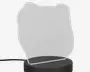 En dekorativ LED-lampe med en klar akrylplade formet som en videospil-controller, med indgraverede detaljer der fremhæver knapper og konturer. Pladen er monteret på en rund, sort base, som indeholder LED-lyskilden og har et strømkabel, der går ud fra siden. Lampen er designet til at skabe en 3D-effekt, når den er tændt.