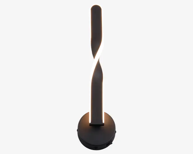 Moderne bordlampe med en snoet, lodret LED-lysstav monteret på en rund, flad fod. Lampen har et slankt, minimalistisk design med mat sort finish og udsender et blødt, jævnt lys langs hele den snoede stav. Lyset er integreret i strukturen, hvilket giver et sømløst og moderne udtryk.