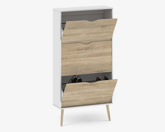 Høj, smal skab med hvid ramme og fronter i lyst trælook. Har to store, nedklappelige rum med buede udskæringer som håndtag for nem åbning. Skabet står på fire skrå træben og er indrettet med indvendige hylder, der egner sig til opbevaring af flere par sko.