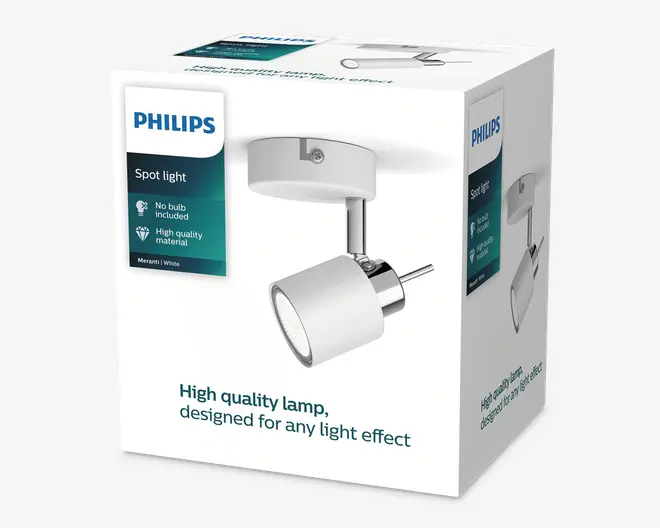 Billedet viser en detailæske til en Philips spotlampe. Æsken har et foto af produktet, som har et moderne, cylindrisk hvidt lampehoved med metalaccent og et rundt loftbeslag. Emballagen fremhæver, at der ikke medfølger pære, og at lampen er lavet af materialer i høj kvalitet. Designet er minimalistisk, og lampehovedet ser ud til at kunne justeres for retningsbestemt belysning.